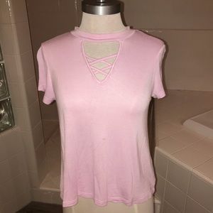 Pink T-shirt with cross detailing on the front